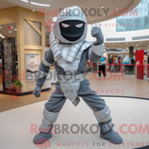 Mascot character of a Silver Ninja dressed with a Flare Jeans and Ties