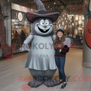 Mascot character of a Gray Witch'S Hat dressed with a Mom Jeans and Cummerbunds