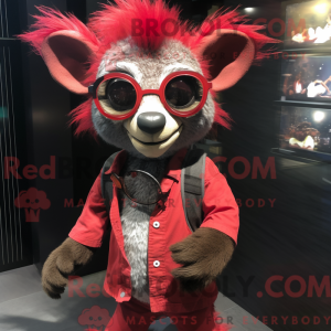 Mascot character of a Red Aye-Aye dressed with a Vest and Eyeglasses