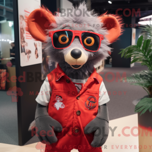Mascot character of a Red Aye-Aye dressed with a Vest and Eyeglasses