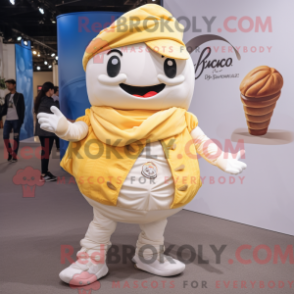 Mascot character of a Cream Croissant dressed with a Boyfriend Jeans and Keychains