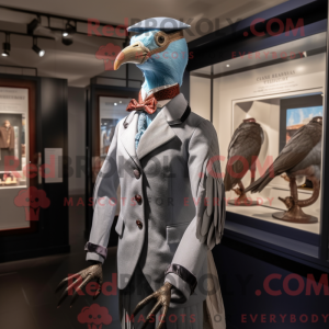 Mascot character of a Silver Passenger Pigeon dressed with a Suit and Berets
