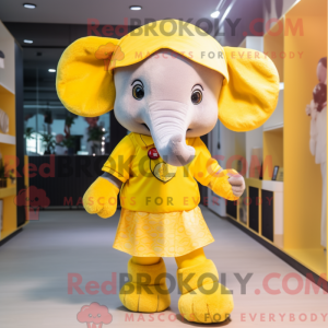 Mascot character of a Yellow Elephant dressed with a Mini Skirt and Headbands