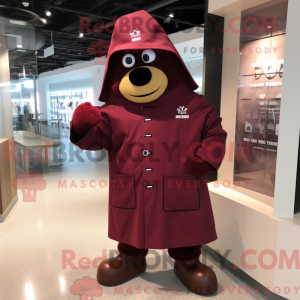Mascot character of a Maroon Police Officer dressed with a Raincoat and Shawl pins