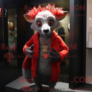 Mascot character of a Red Aye-Aye dressed with a Cardigan and Beanies