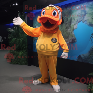 Mascot character of a Gold Clown Fish dressed with a Long Sleeve Tee and Caps