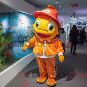 Mascot character of a Gold Clown Fish dressed with a Long Sleeve Tee and Caps