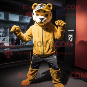 Mascot character of a Gold Puma dressed with a Long Sleeve Tee and Beanies