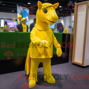Mascot character of a Yellow Horse dressed with a Cover-up and Foot pads