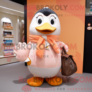 Mascot character of a Peach Penguin dressed with a Coat and Tote bags