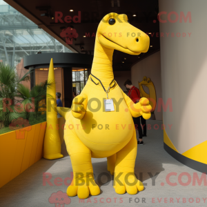 Mascot character of a Yellow Brachiosaurus dressed with a Polo Tee and Suspenders