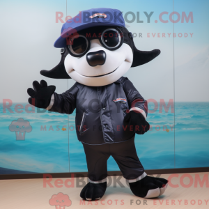 Mascot character of a Navy Killer Whale dressed with a Bermuda Shorts and Eyeglasses