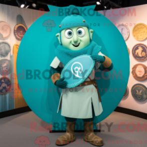 Mascot character of a Turquoise Celtic Shield dressed with a Henley Tee and Caps