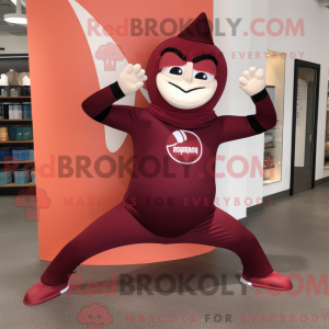 Mascot character of a Maroon Contortionist dressed with a Yoga Pants and Messenger bags