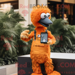 Mascot character of a Orange Ostrich dressed with a Overalls and Smartwatches