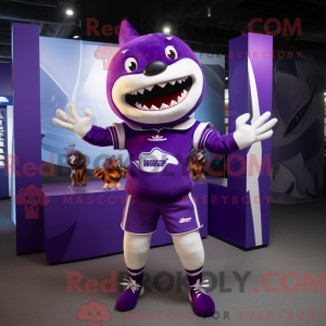 Mascot character of a Purple Shark dressed with a Rugby Shirt and Hairpins