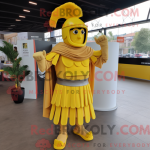 Mascot character of a Yellow Roman Soldier dressed with a Maxi Skirt and Gloves