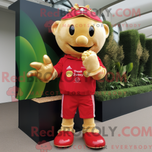 Mascot character of a Gold Strawberry dressed with a Rugby Shirt and Gloves