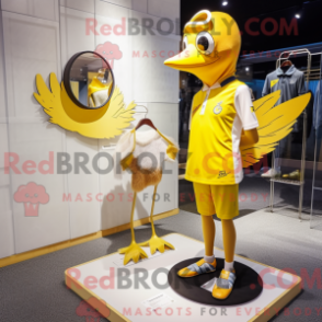 Mascot character of a Gold Pigeon dressed with a One-Piece Swimsuit and Hairpins