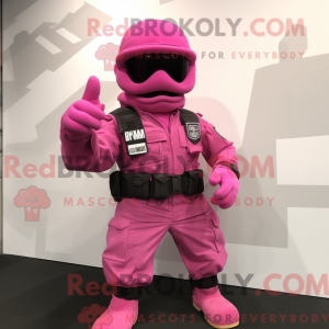 Mascot character of a Pink Commando dressed with a Vest and Gloves