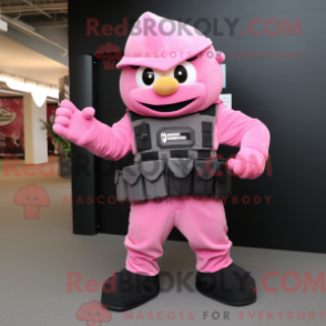 Mascot character of a Pink Commando dressed with a Vest and Gloves