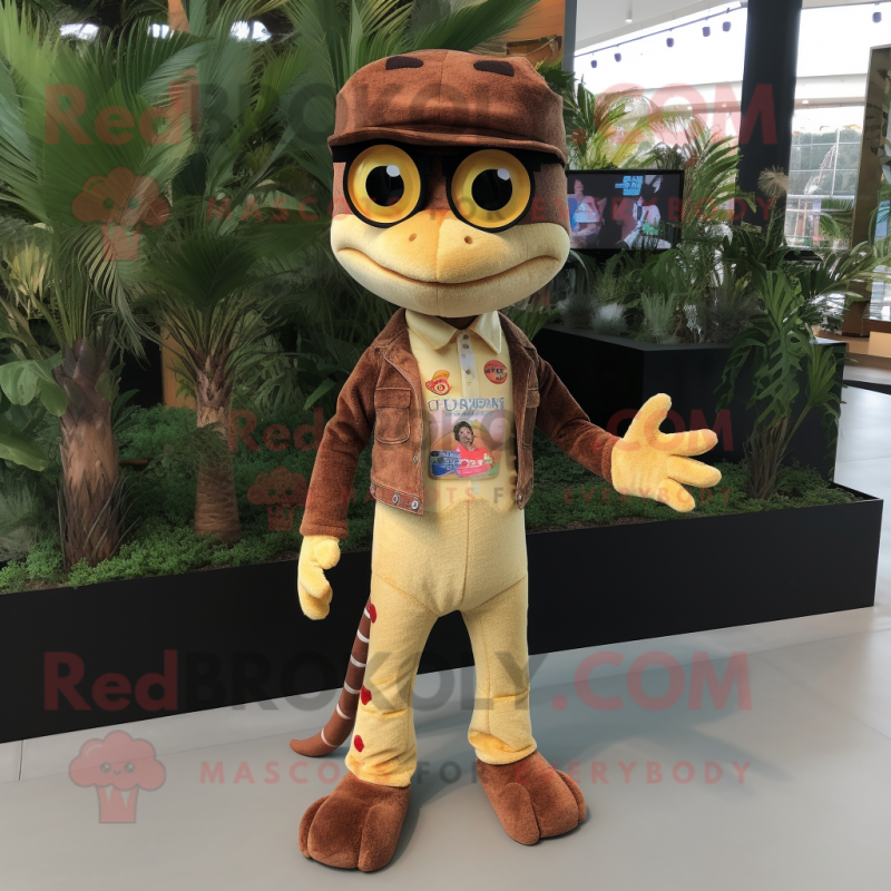 Brown Geckos mascot costume character dressed with a Flare Jeans and ...