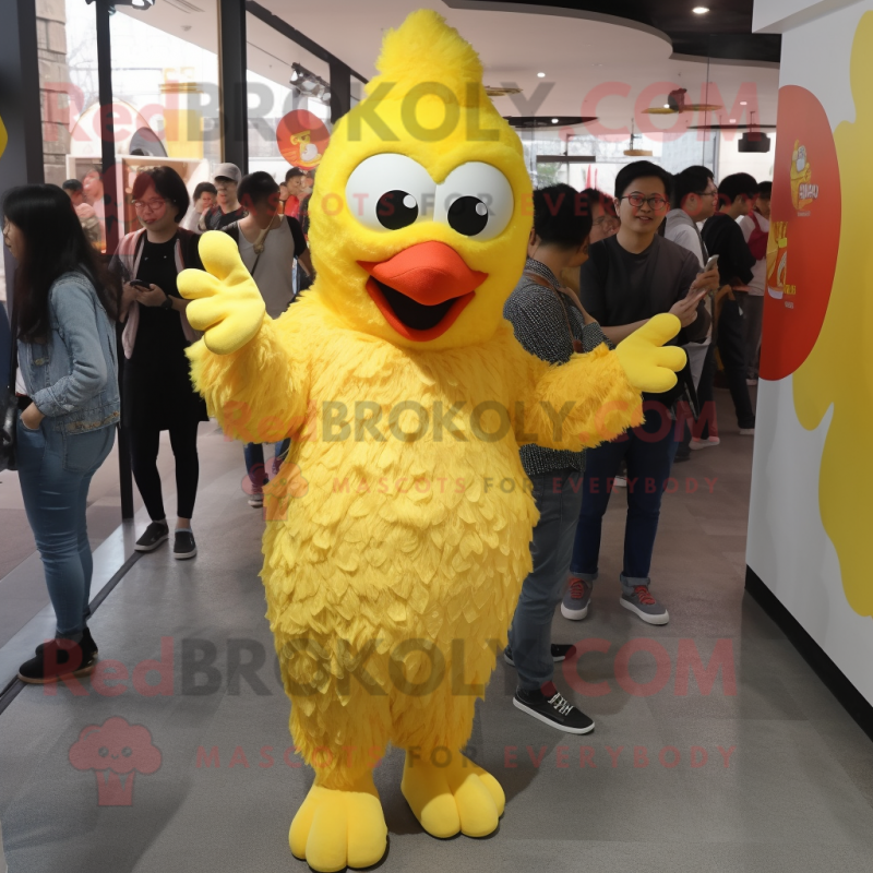 Yellow Fried Chicken mascot costume character dressed with a Boyfriend Jeans and Foot pads