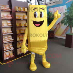 Lemon Yellow Chocolate Bar mascot costume character dressed with a Jumpsuit and Shoe clips