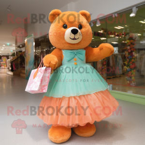 Orange Teddy Bear mascot costume character dressed with a Ball Gown and Tote bags