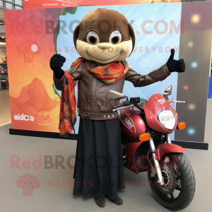 Olive Tikka Masala mascot costume character dressed with a Biker Jacket and Shawl pins