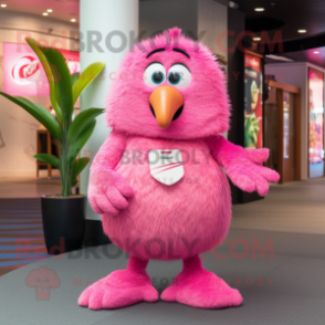 Pink Kiwi mascot costume character dressed with a Playsuit and Rings