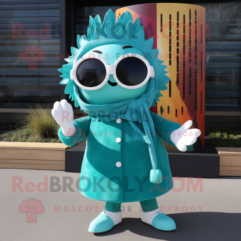 Teal Queen mascot costume character dressed with a Parka and Sunglasses