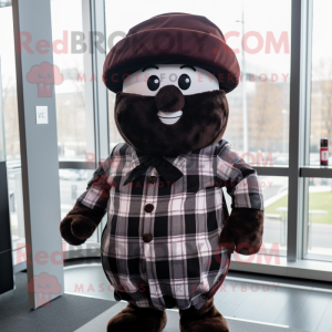 Black Chocolates mascot costume character dressed with a Flannel Shirt and Berets