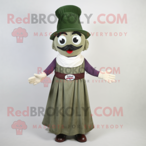 Olive Moussaka mascot costume character dressed with a Empire Waist Dress and Hat pins
