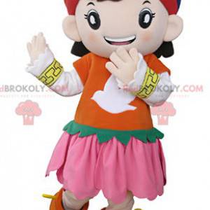 Mascotte de fillette habillée d'une tenue orientale colorée -