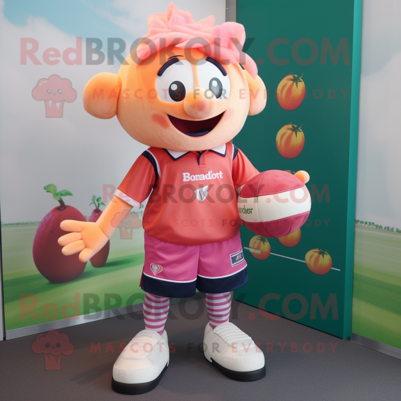 Peach Raspberry mascot costume character dressed with a Rugby Shirt and Cummerbunds