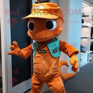 Rust Geckos mascot costume character dressed with a Playsuit and Hats