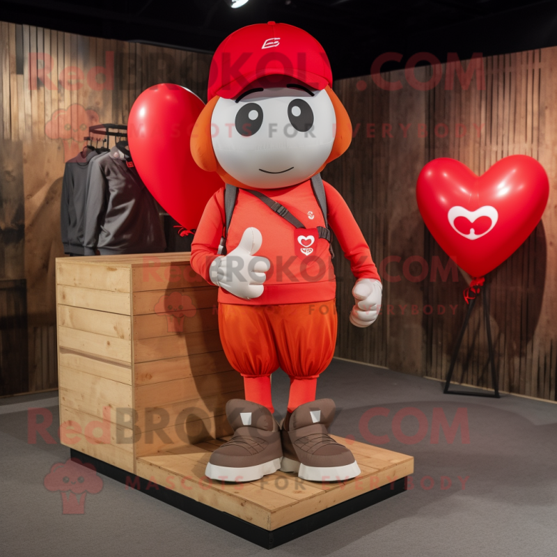 Red Heart Shaped Balloons mascot costume character dressed with a Cargo Shorts and Beanies