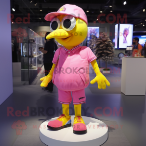 Pink Canary mascot costume character dressed with a Polo Shirt and Shoe laces