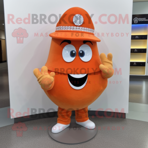Orange Engagement Ring mascot costume character dressed with a Sweatshirt and Hat pins