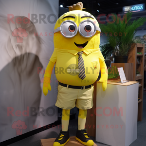 Lemon Yellow Moussaka mascot costume character dressed with a Shorts and Tie pins