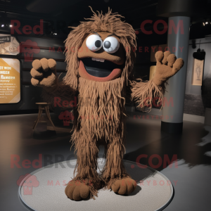 Brown Spaghetti mascot costume character dressed with a Graphic Tee and Gloves