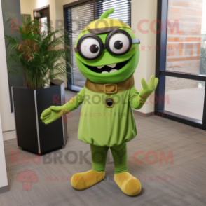 Olive Cyclops mascot costume character dressed with a Dress Pants and Bracelets