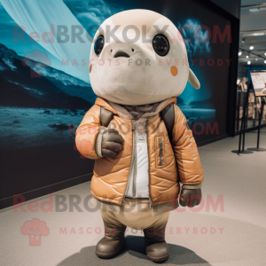 Tan Narwhal mascot costume character dressed with a Bomber Jacket and Scarves