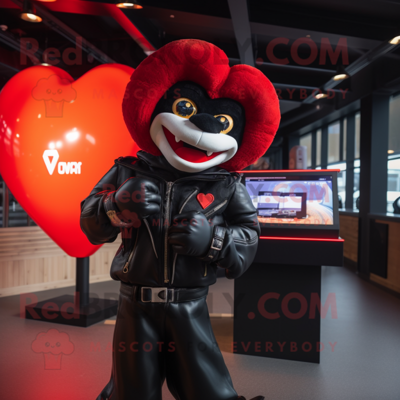 Red Heart mascot costume character dressed with a Leather Jacket and Mittens
