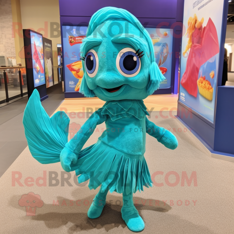 Teal Betta Fish mascot costume character dressed with a Jacket and Hat pins  - Mascot Costumes -  Sizes L (175-180CM)