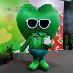 Green Heart Shaped Balloons mascot costume character dressed with a Coat and Sunglasses