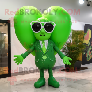 Green Heart Shaped Balloons mascot costume character dressed with a Coat and Sunglasses
