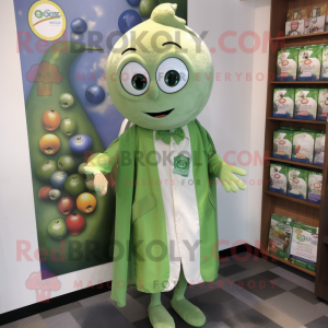 Olive Candy Box mascot costume character dressed with a Oxford Shirt and Shawl pins