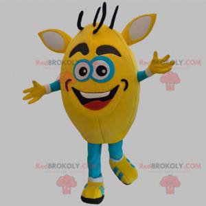 Geel en blauw sneeuwpopmascotte. Monster mascotte -